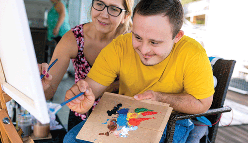 Young ndis participant learns to paint